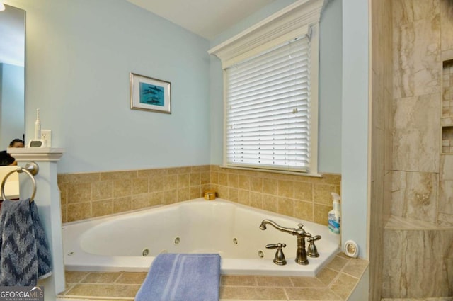 bathroom with tiled bath