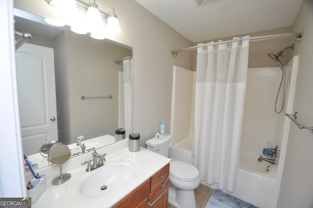 full bathroom featuring vanity, shower / tub combo, toilet, and tile patterned flooring