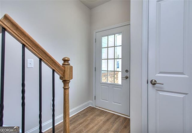 doorway to outside with light wood-type flooring