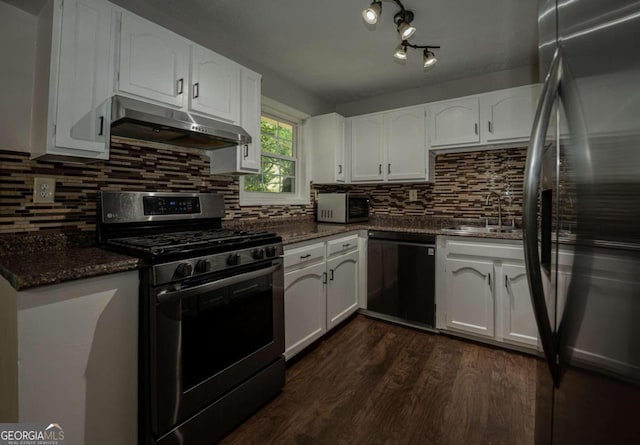 kitchen featuring white cabinets, stainless steel appliances, dark hardwood / wood-style floors, and sink