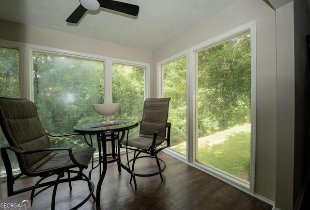 sunroom / solarium with ceiling fan