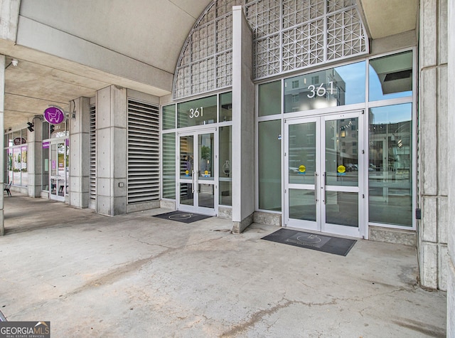 entrance to property featuring french doors