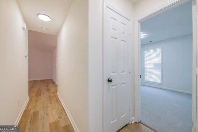 corridor featuring light wood-type flooring