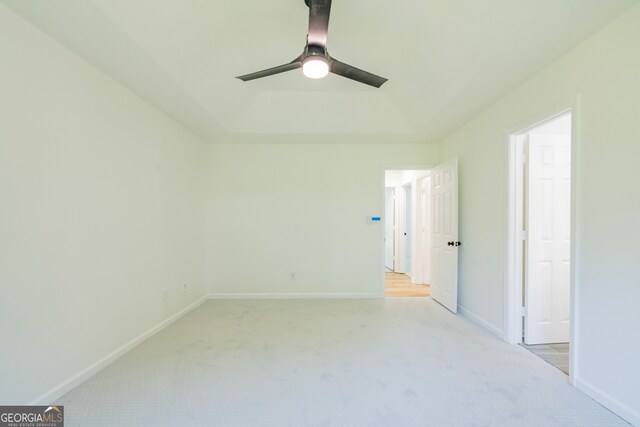 unfurnished bedroom with ceiling fan and light carpet