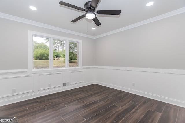 unfurnished room with crown molding, ceiling fan, and dark hardwood / wood-style floors