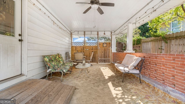 sunroom / solarium with ceiling fan