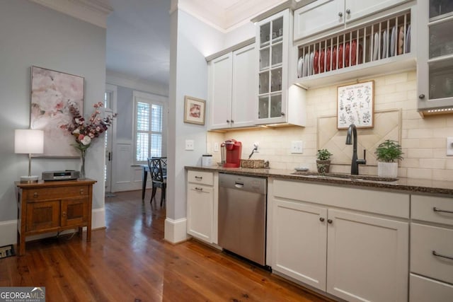 kitchen featuring dishwasher, dark hardwood / wood-style flooring, sink, and white cabinets