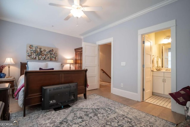 bedroom with ceiling fan, ornamental molding, hardwood / wood-style floors, and connected bathroom