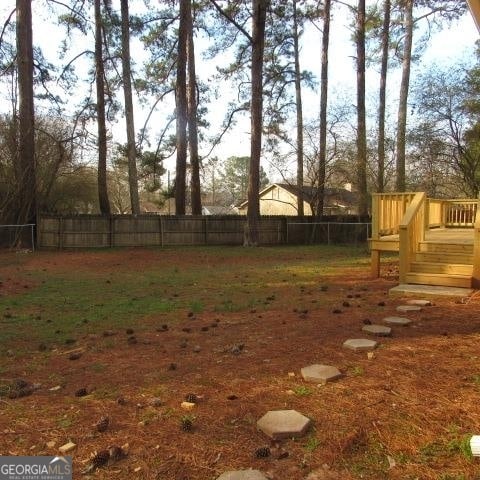 view of yard with a deck