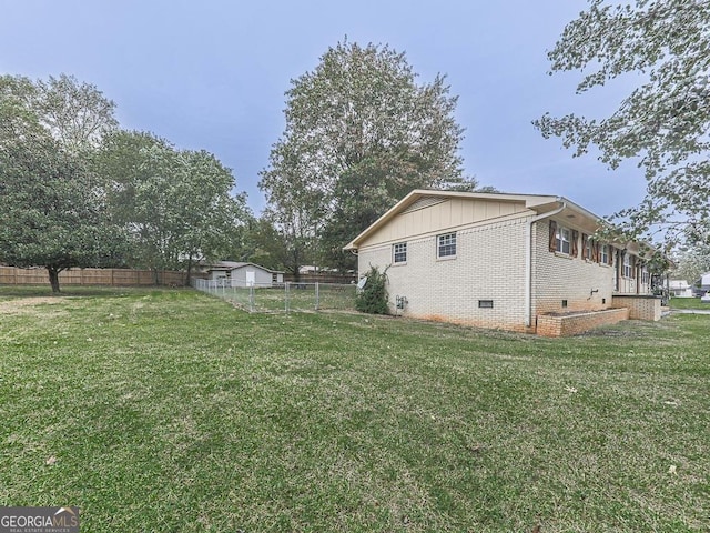 view of home's exterior featuring a lawn