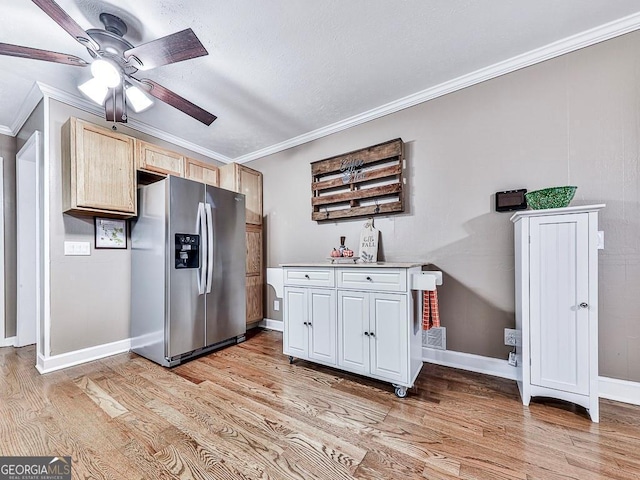 kitchen featuring stainless steel fridge with ice dispenser, light hardwood / wood-style flooring, light brown cabinets, ornamental molding, and ceiling fan