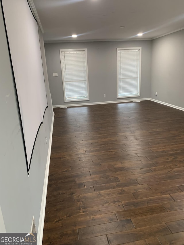 unfurnished room featuring dark hardwood / wood-style floors