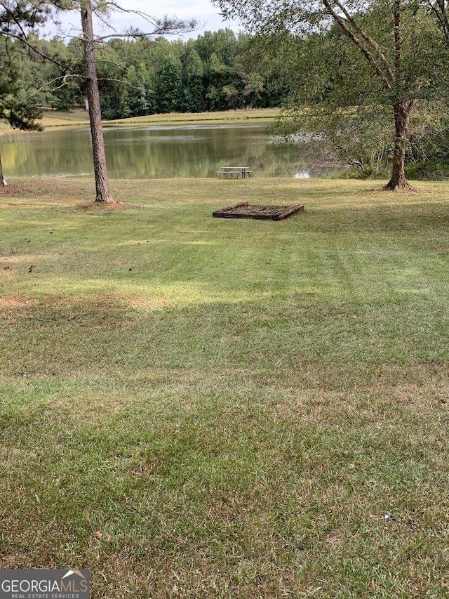 view of yard with a water view