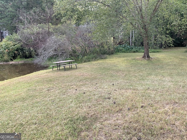 view of yard with a water view