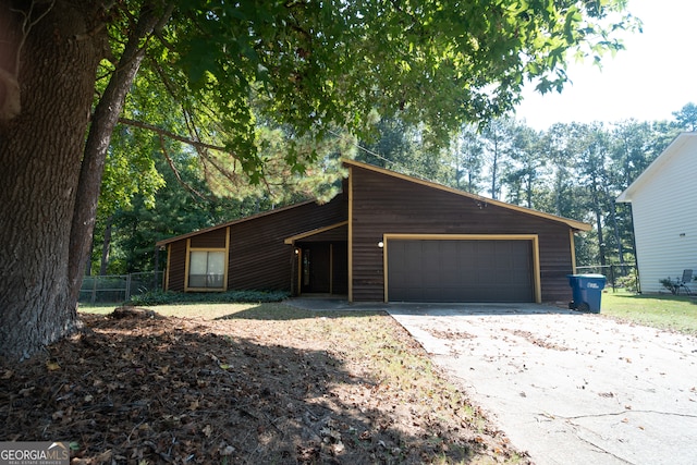 view of front of home with a garage