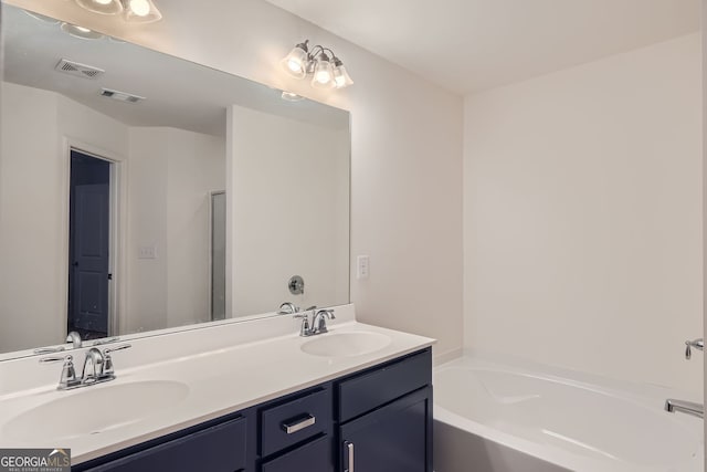 bathroom featuring vanity and separate shower and tub