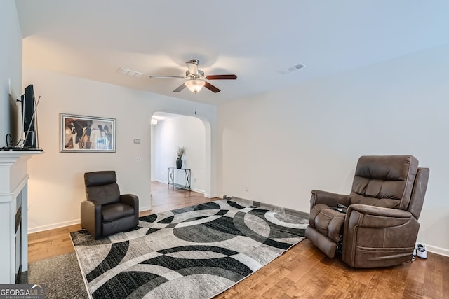 interior space featuring ceiling fan and hardwood / wood-style flooring