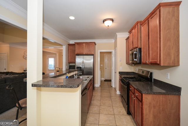 kitchen with light tile patterned flooring, a breakfast bar area, stainless steel appliances, kitchen peninsula, and ornamental molding