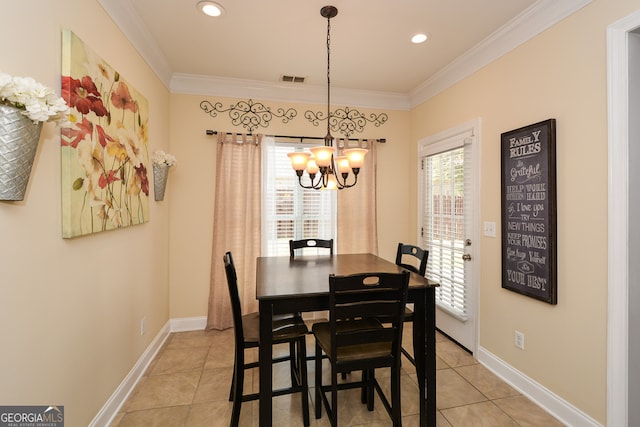 dining space with ornamental molding, a notable chandelier, a wealth of natural light, and light tile patterned floors