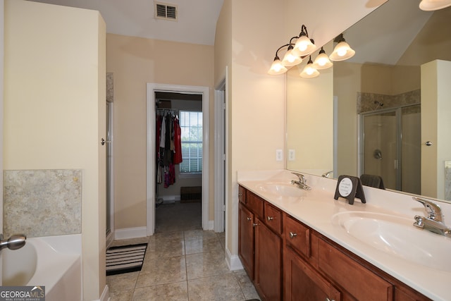 bathroom with vanity, plus walk in shower, and tile patterned floors