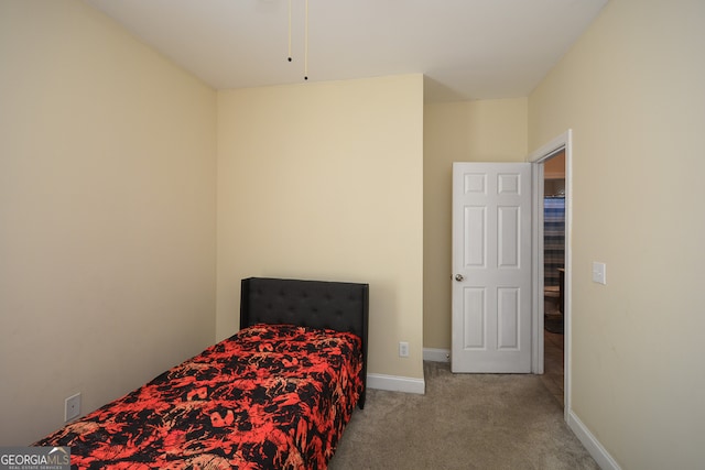 bedroom with light carpet