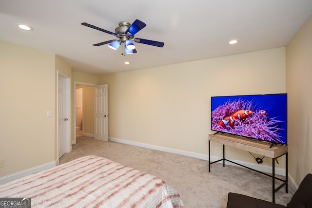 carpeted bedroom with ceiling fan