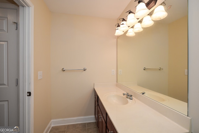 bathroom with tile patterned flooring and vanity