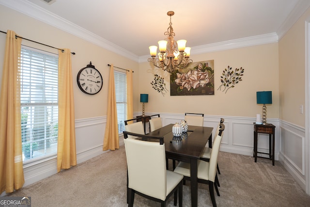 carpeted dining area featuring crown molding, an inviting chandelier, and a healthy amount of sunlight