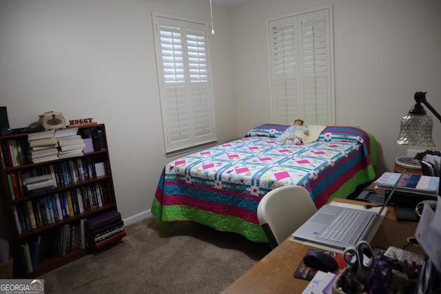 bedroom featuring carpet