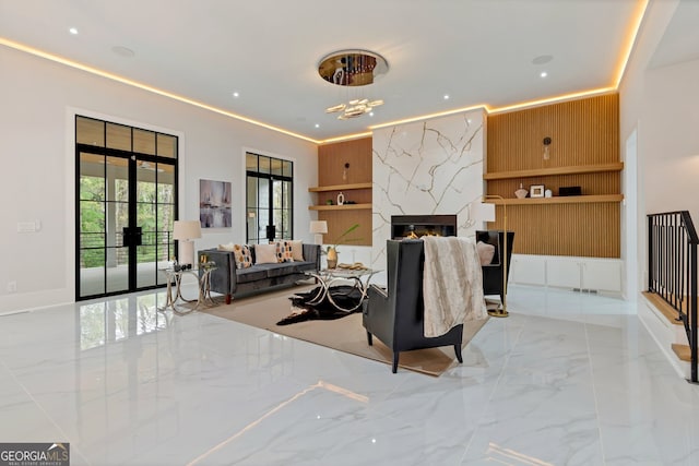 living room with a fireplace and french doors