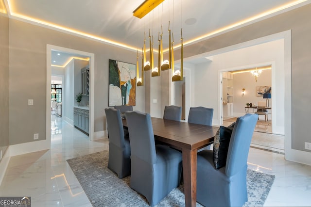 dining room with a notable chandelier