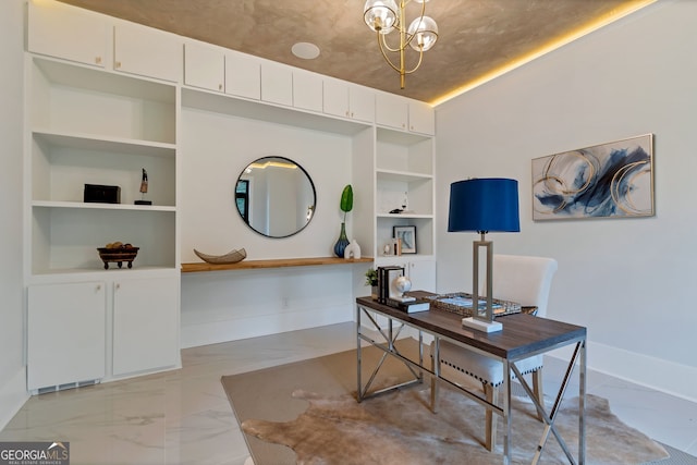 office space featuring built in shelves and an inviting chandelier