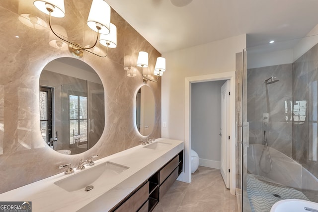 bathroom with vanity, toilet, and an enclosed shower