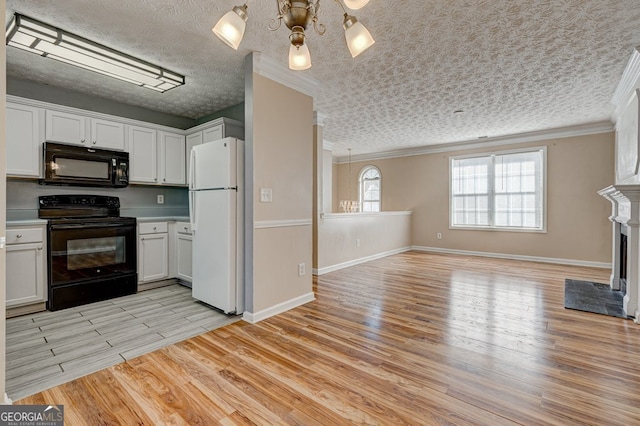 kitchen with white cabinets and black appliances