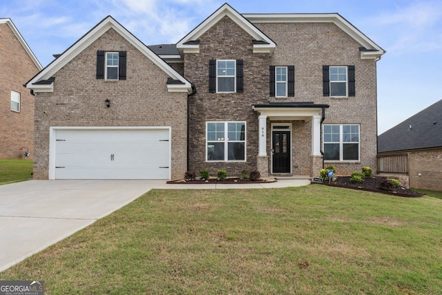 view of front of home featuring an attached garage, driveway, a front lawn, and brick siding