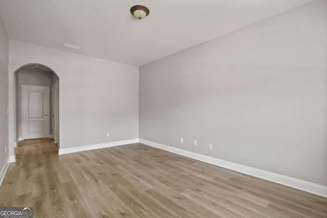 empty room with light hardwood / wood-style floors