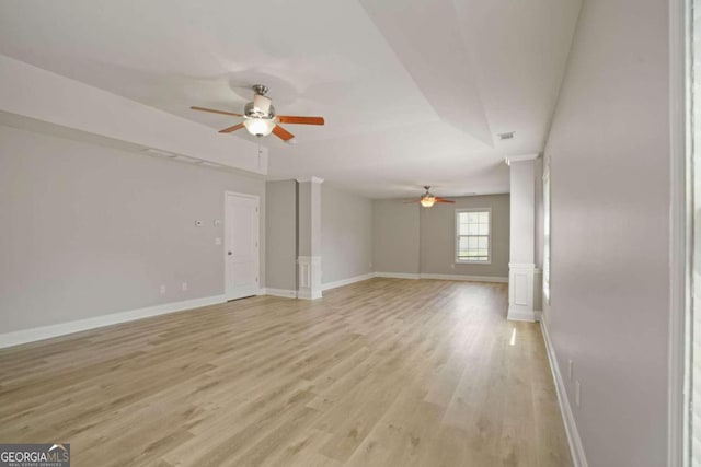 interior space featuring light wood-type flooring and ceiling fan