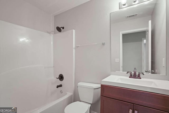 full bathroom featuring vanity, toilet, and shower / bathtub combination