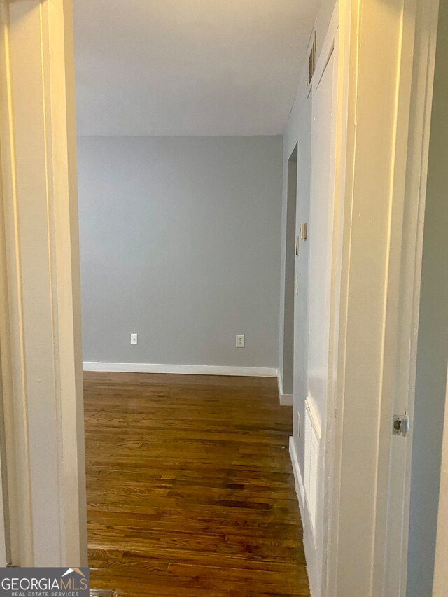 hall featuring dark hardwood / wood-style flooring