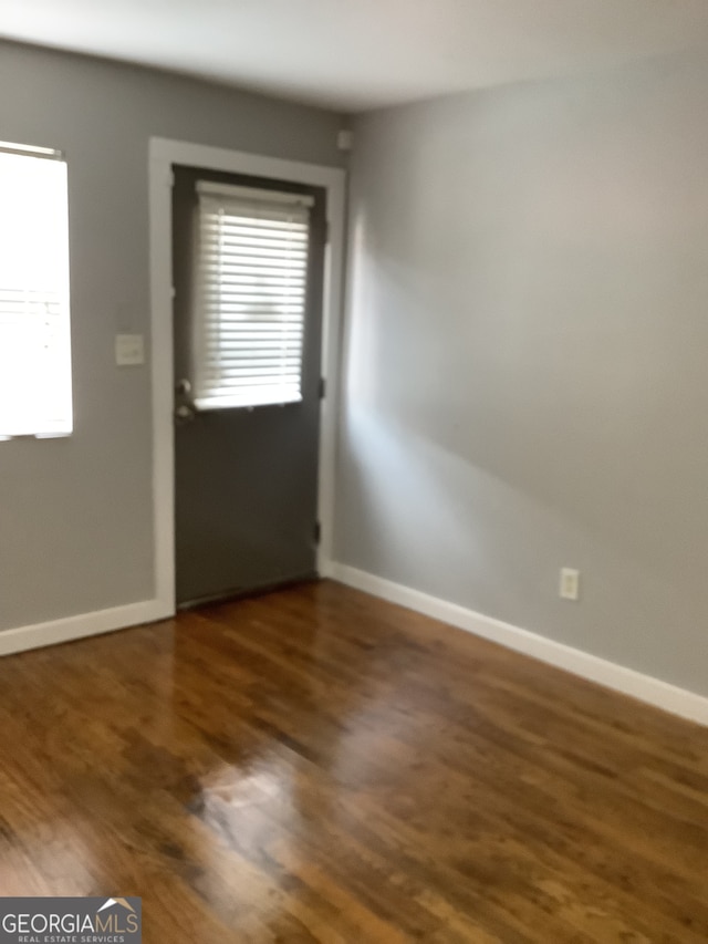 interior space featuring dark hardwood / wood-style flooring