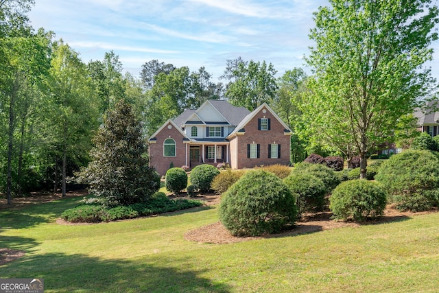 front facade with a front yard