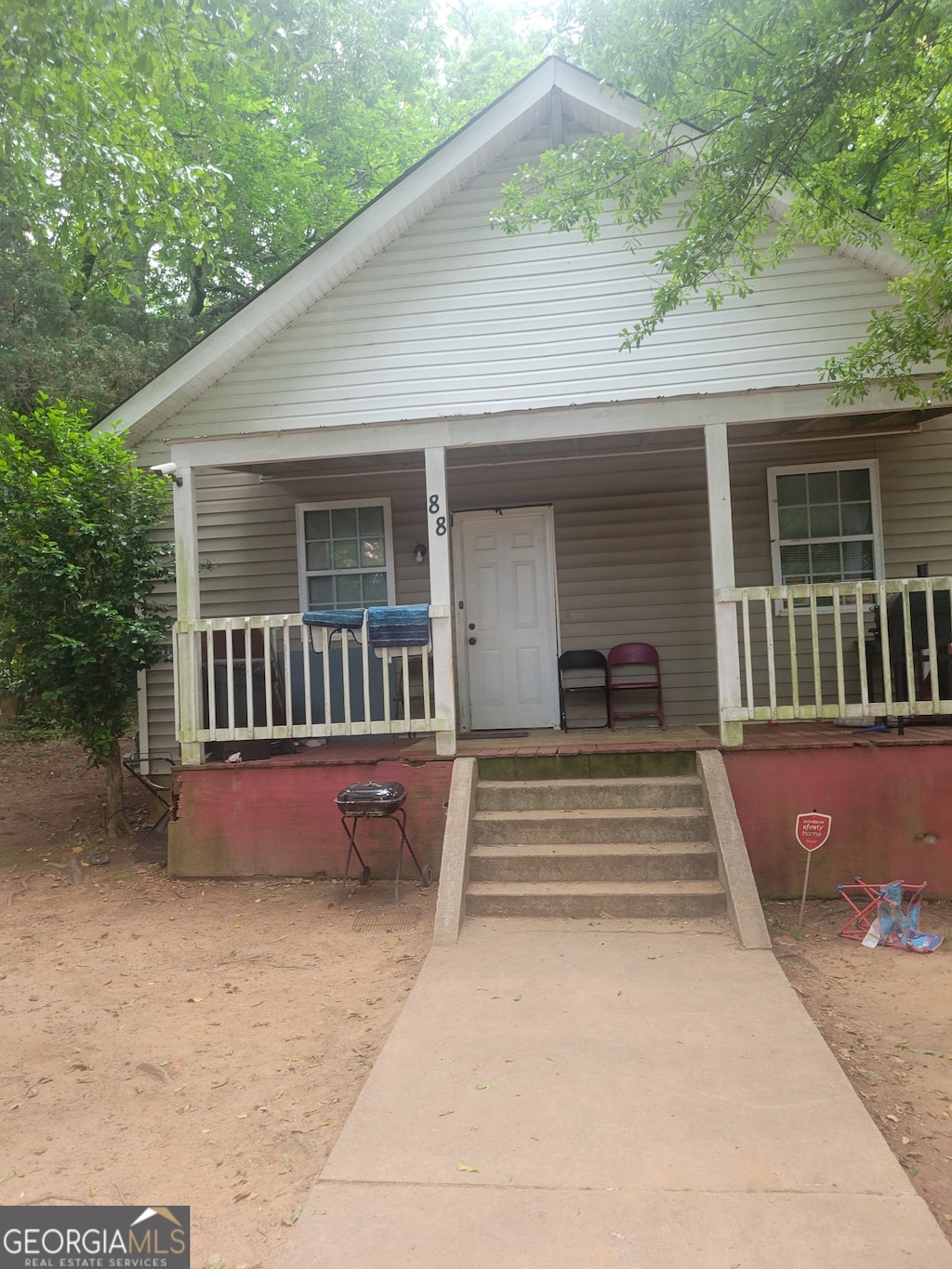 bungalow-style home with a porch