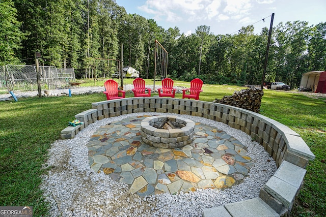 view of patio / terrace featuring a fire pit