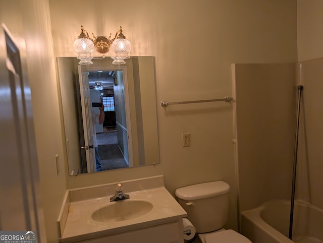 full bathroom with vanity, toilet, and bathtub / shower combination