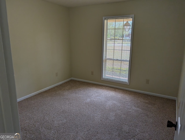 view of carpeted spare room