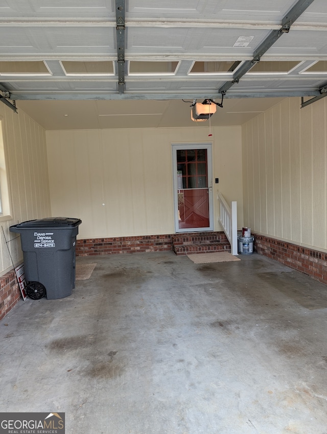 garage featuring a garage door opener