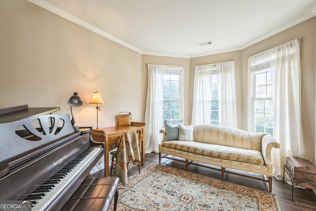 living room with crown molding and dark hardwood / wood-style floors