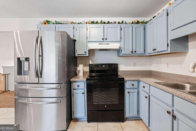 kitchen with a textured ceiling, black electric range oven, stainless steel fridge with ice dispenser, and light tile patterned flooring