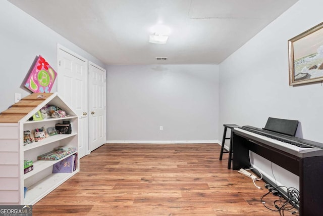 misc room with hardwood / wood-style flooring