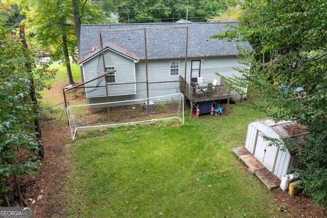 exterior space with a yard and a deck